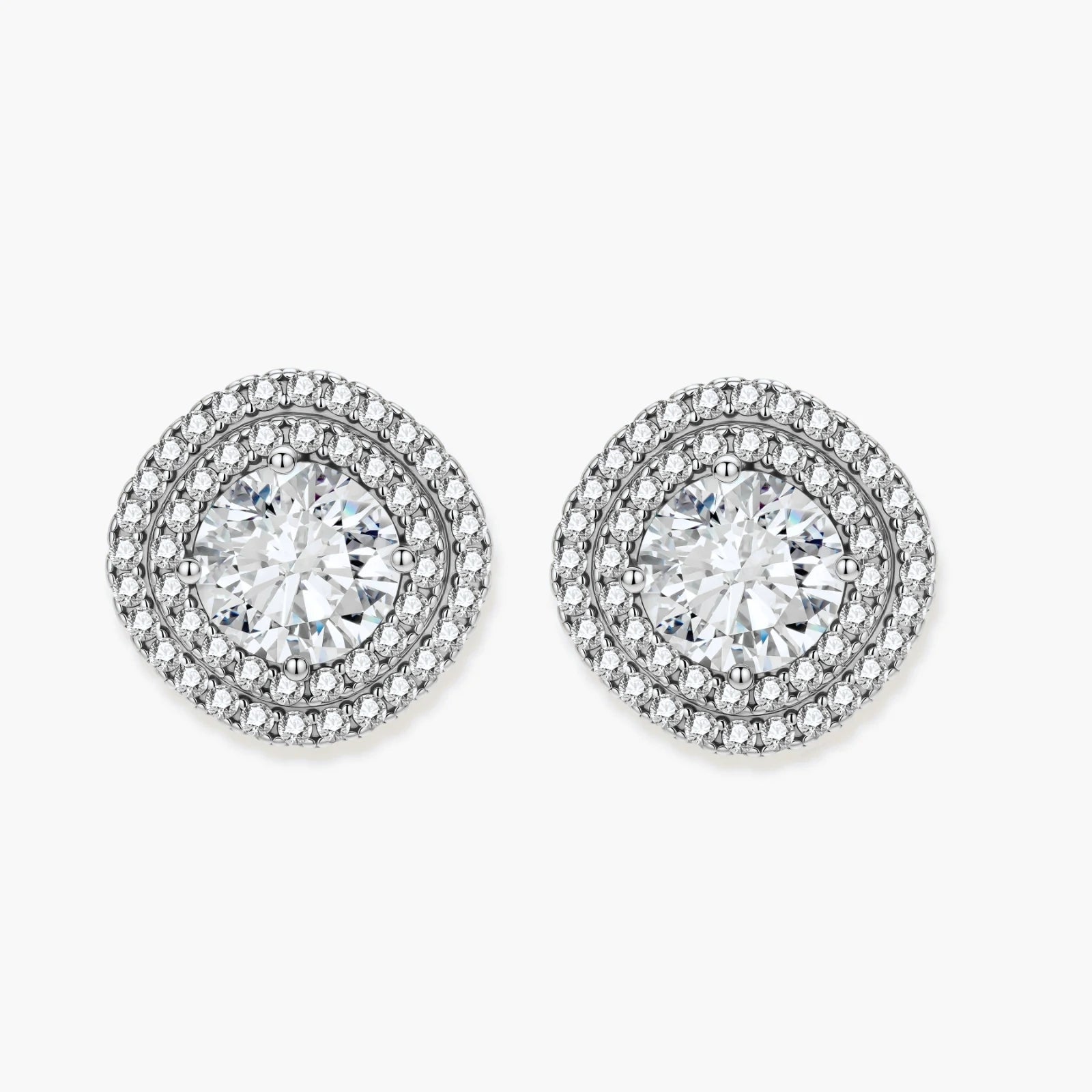 Double halo sterling silver stud earrings with brilliant round moissanite center stones and pavé crystal accents