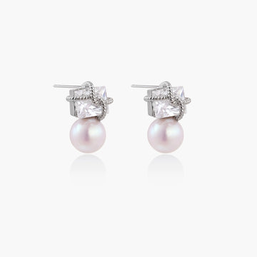 White gold stud earrings with square crystal stones in twisted frames and pink freshwater pearl drops below
