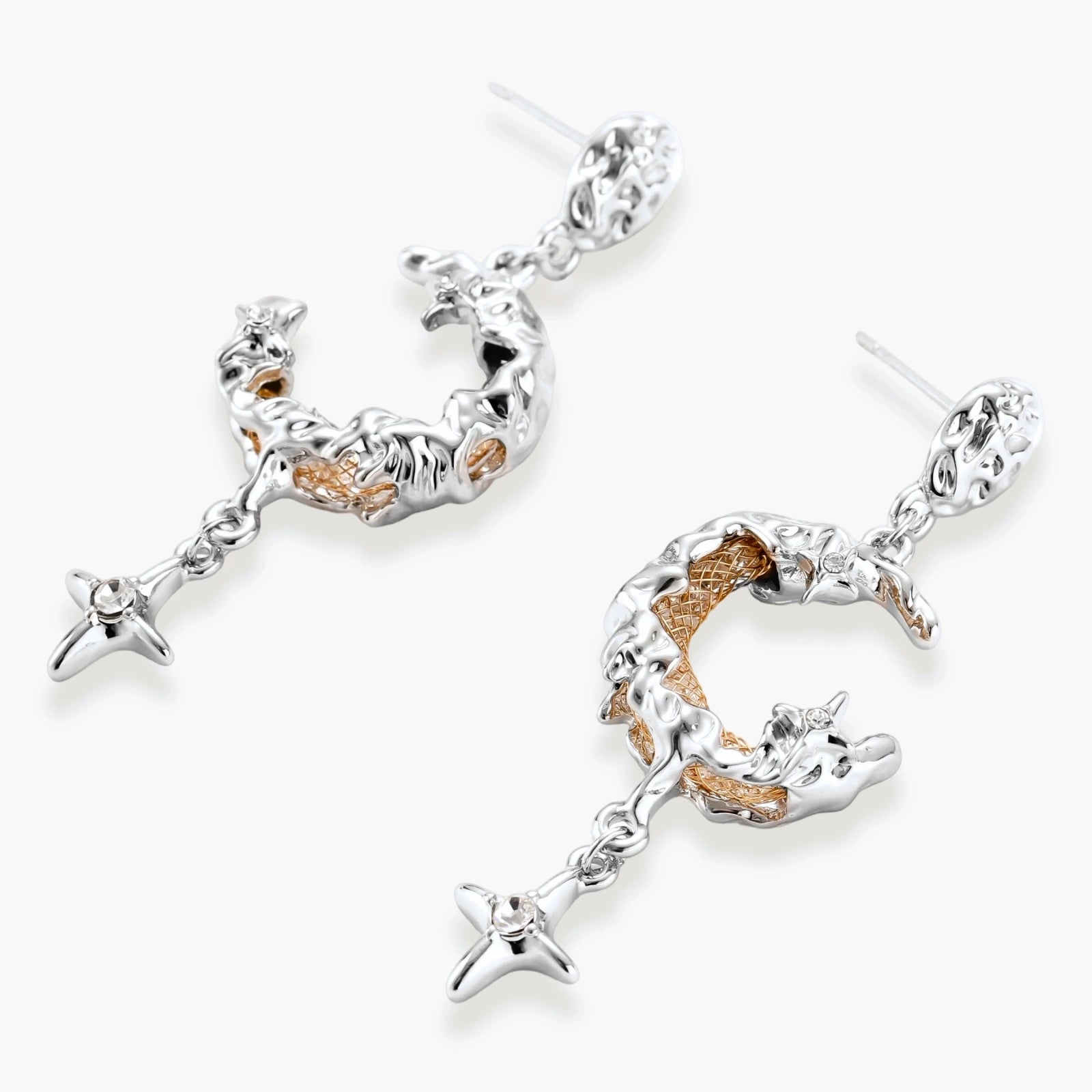 Mixed-metal jewelry set featuring layered necklaces with crescent moon pendant and pearl beads, plus matching star-drop earrings.