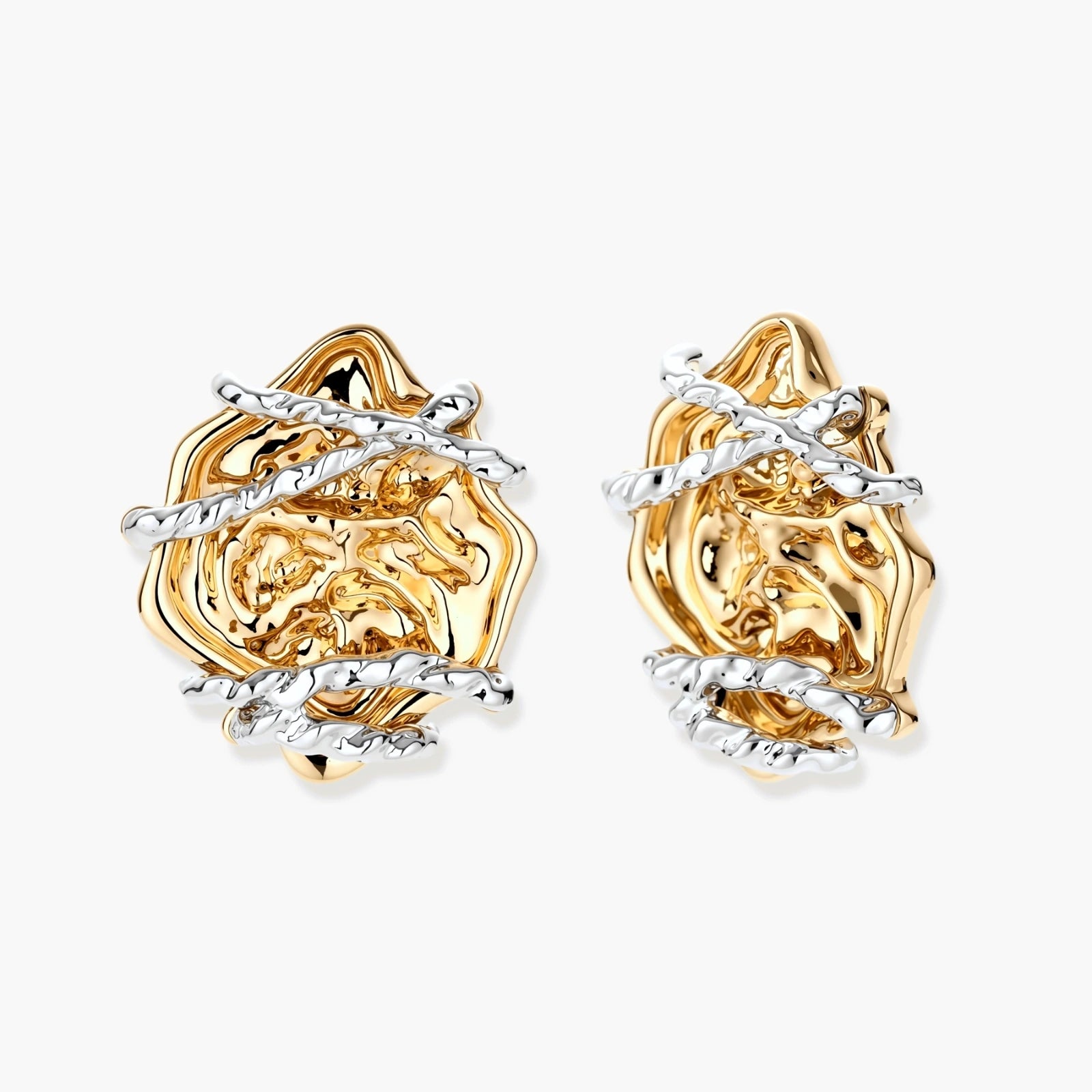 Sculptural rose-shaped stud earrings in gold with silver wire details and S925 posts on cream background.