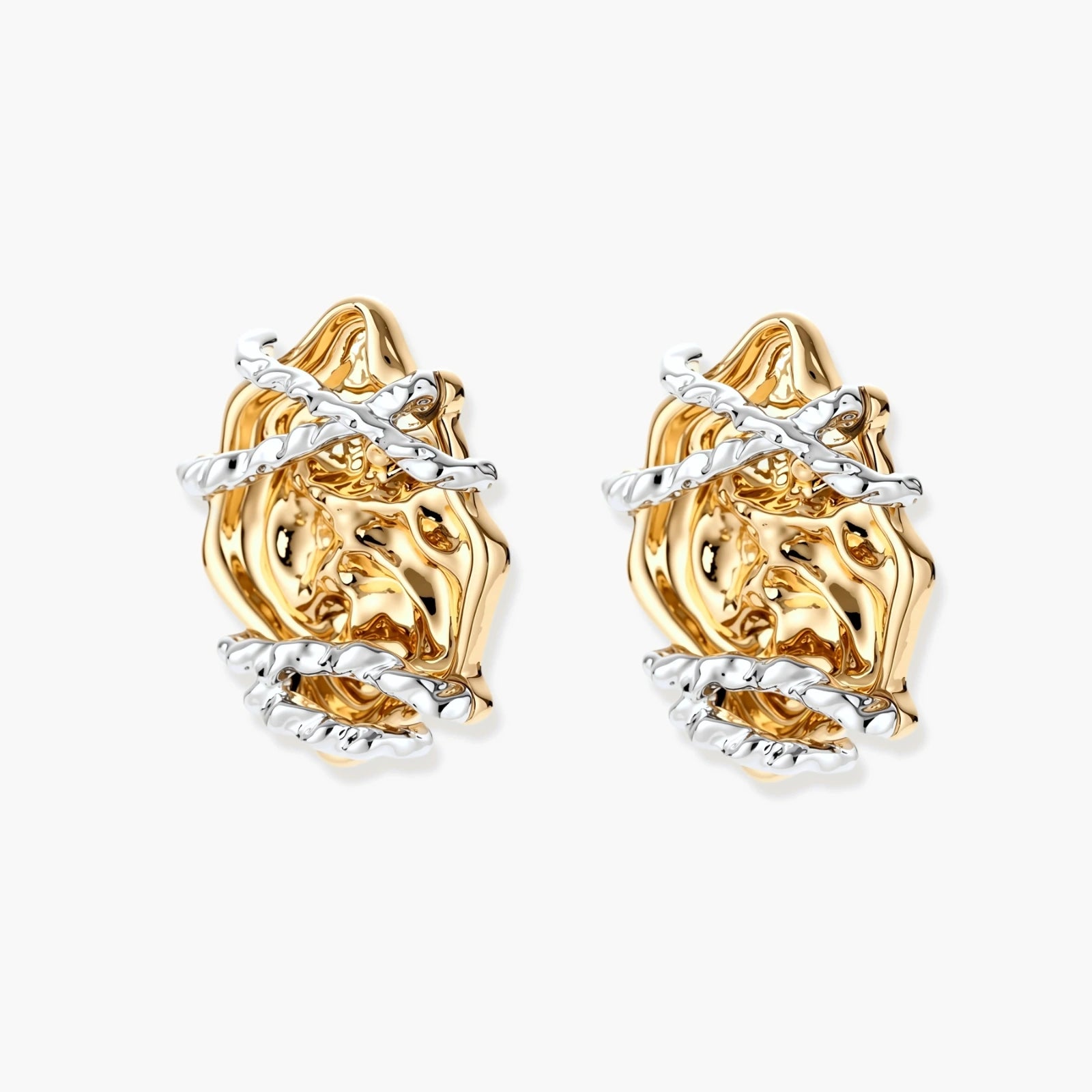 Sculptural rose-shaped stud earrings in gold with silver wire details and S925 posts on cream background.