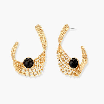 Gold-tone sculptural earrings with interwoven mesh design and black resin stone accents on white background.