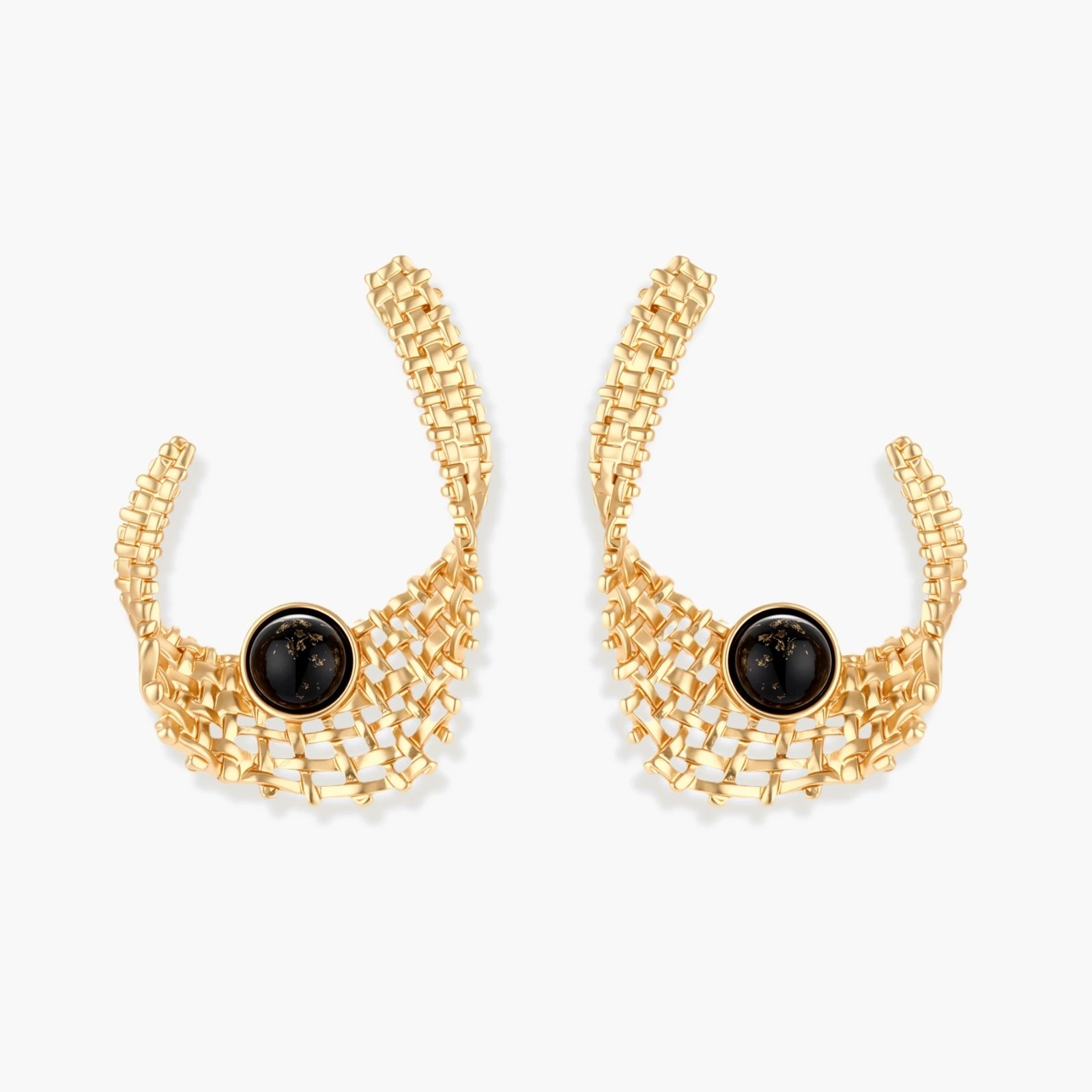 Gold-tone sculptural earrings with interwoven mesh design and black resin stone accents on white background.