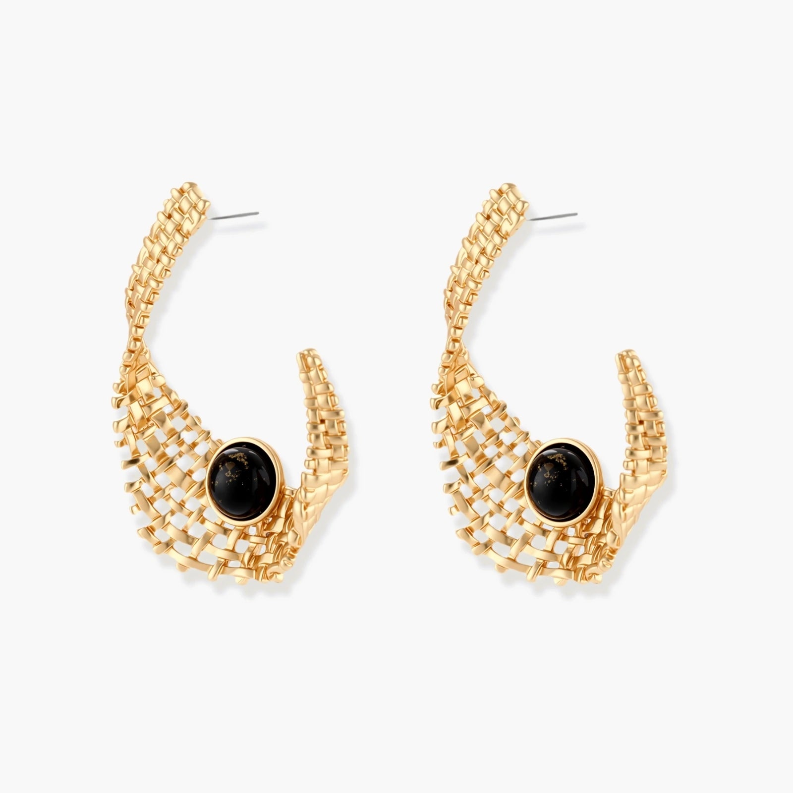 Gold-tone sculptural earrings with interwoven mesh design and black resin stone accents on white background.