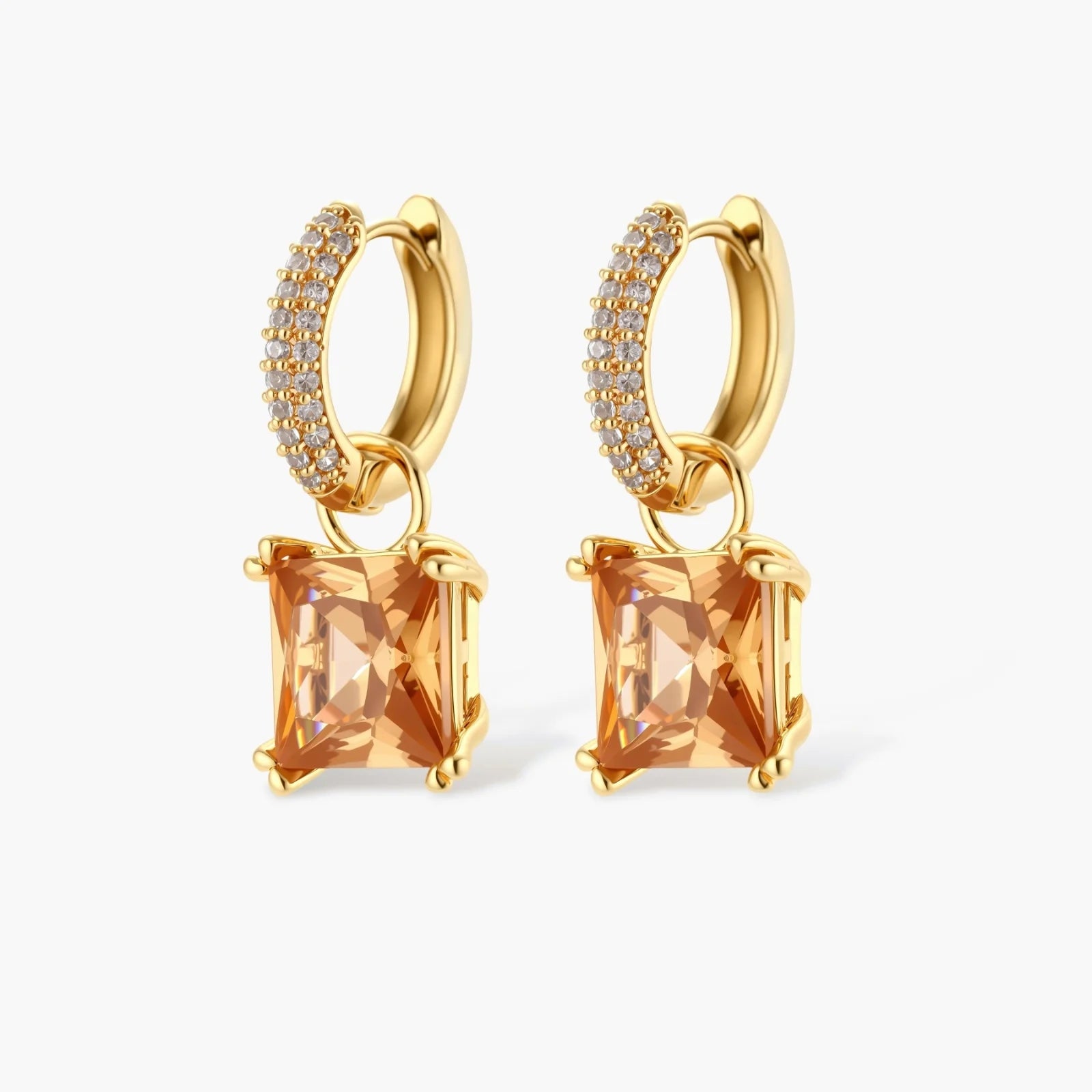 14K gold plated jewelry set featuring square champagne CZ stones with sparkling huggie earrings on cream background.